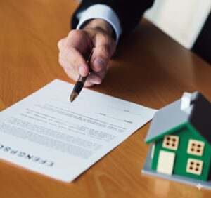a member of the HOA goes over association dues paperwork before presenting it to management company