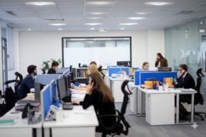 employees working busy at hoa management company office