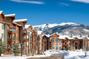 scenic snowy view of condo community in Vail